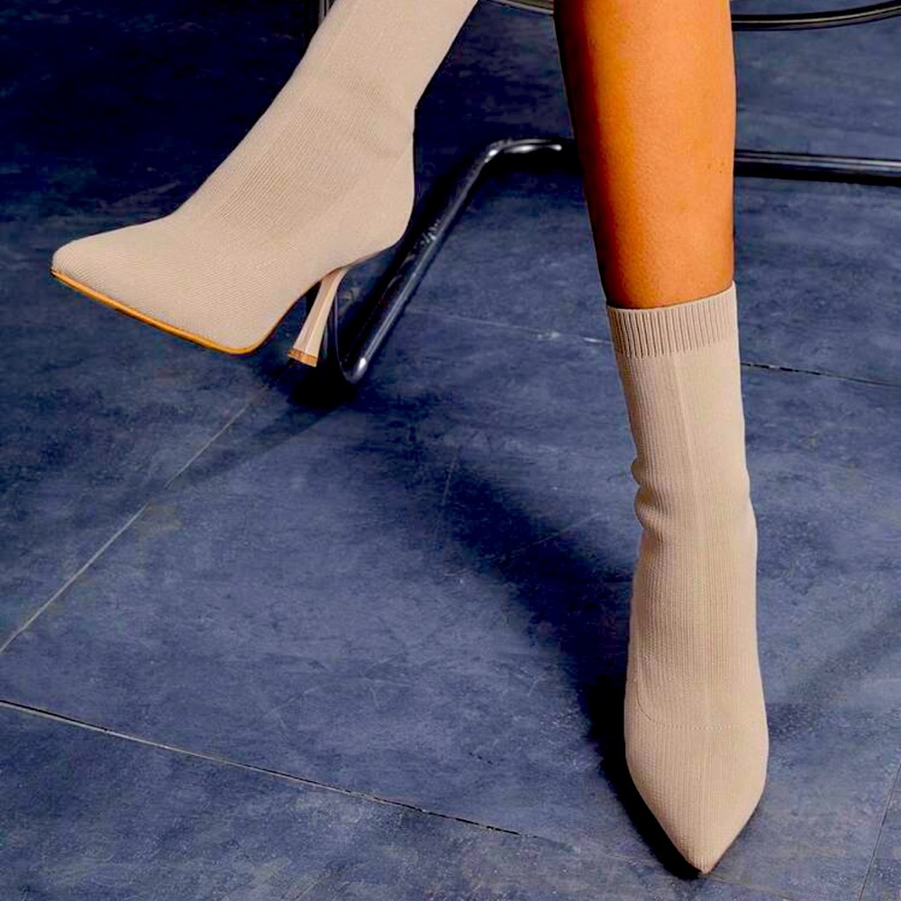 Heeled sock boots in size 40/ US 9